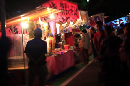 Street vendors line up in the night